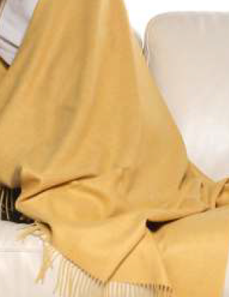 Manta melange amarilla tejida en lana de baby alpaca de Perú